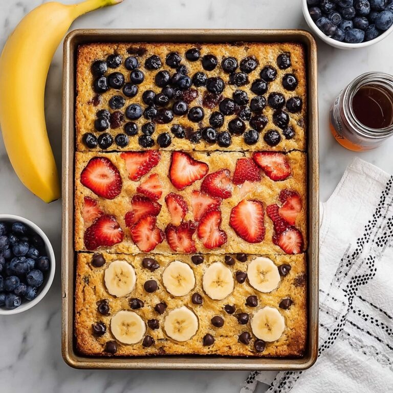 Sheet Pan Pancakes with Mixed Berries, Bananas, and Chocolate Chips Recipe