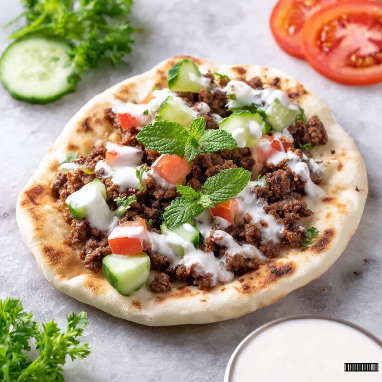 Spiced Lamb Pitas with Feta Mint Sauce Recipe